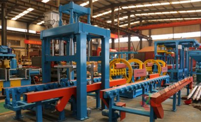 青岛恒林工业集团设计制作的铁模覆砂自动化造型线单机图片